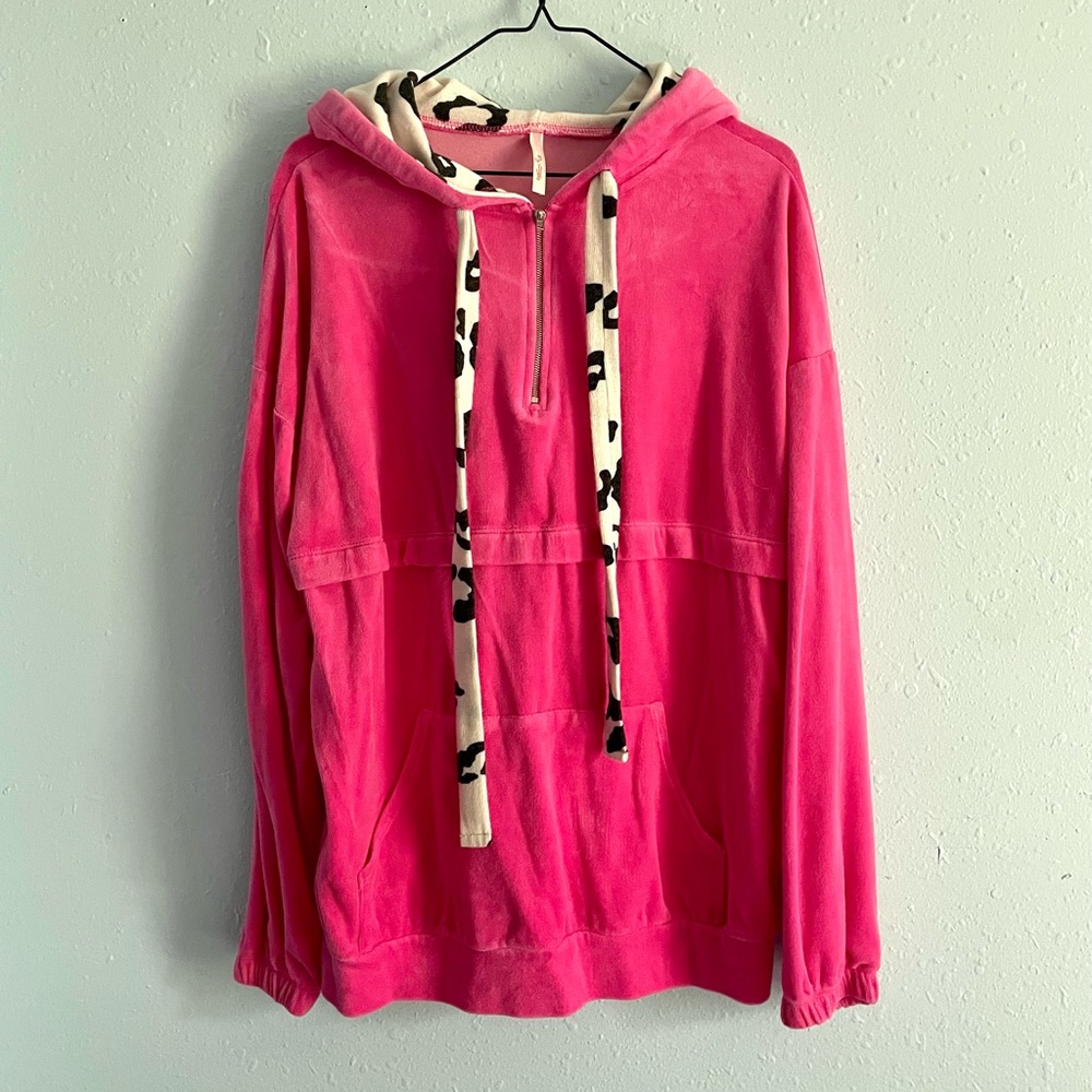 Hot pink fuzzy pullover with leopard accents
